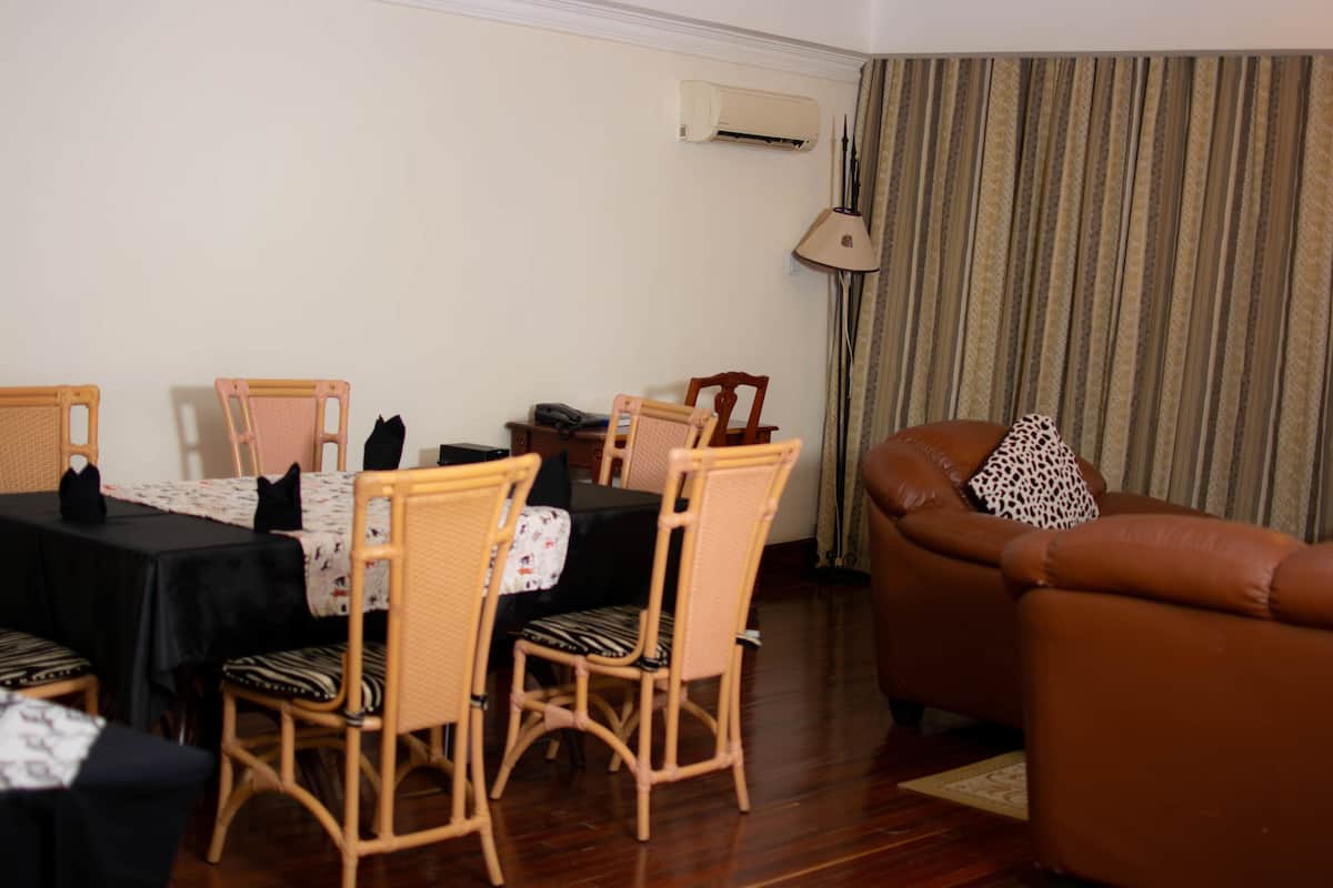 Suite exécutive, 1 chambre | Repas dans la chambre