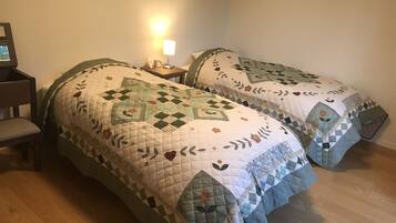 1 bedroom, desk, laptop workspace