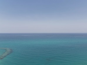 A view of the ocean with a clear sky. - Townhouse Tropea (Tropea)