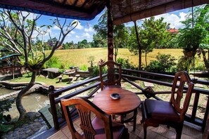 Superior Triple Room | Terrace/patio - Ganesha Ubud Inn (Ubud)