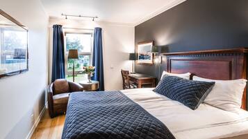 Double Room | Desk, blackout drapes, iron/ironing board, cribs/infant beds