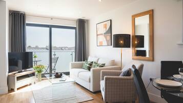 Executive Apartment, 1 Bedroom, Balcony | Living area | 43-inch Smart TV with digital channels, Netflix, streaming services