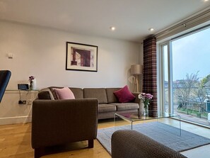 Superior Apartment, 2 Bedrooms | Living area | 43-inch Smart TV with digital channels, Netflix, heated floors - Your Space Apartments - The Hamilton's (Cambridge)