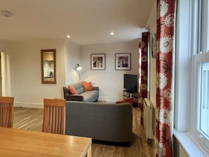 Duplex, 2 Bedrooms, 2 Bathrooms | Living area | 43-inch Smart TV with digital channels, Netflix, streaming services