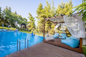 Outdoor pool, pool umbrellas, pool loungers