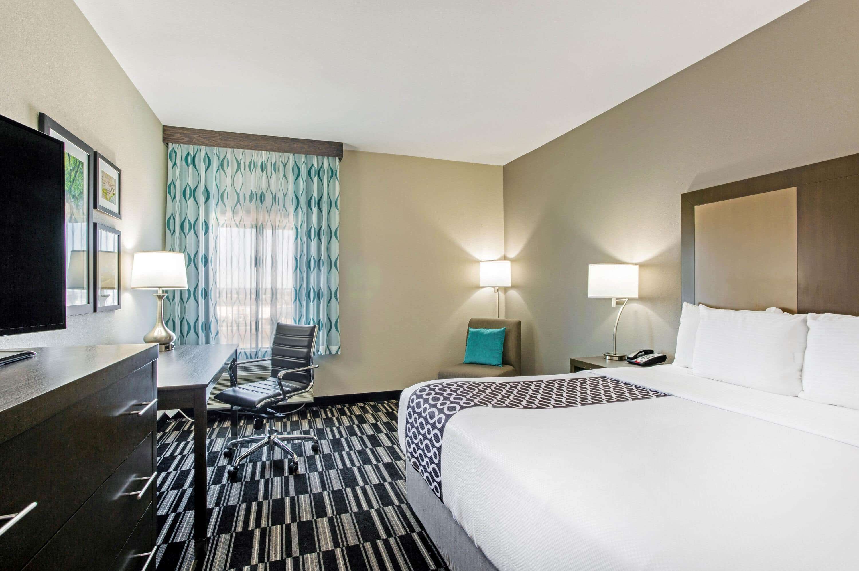 premium bedding, pillow-top beds, desk, iron/ironing board