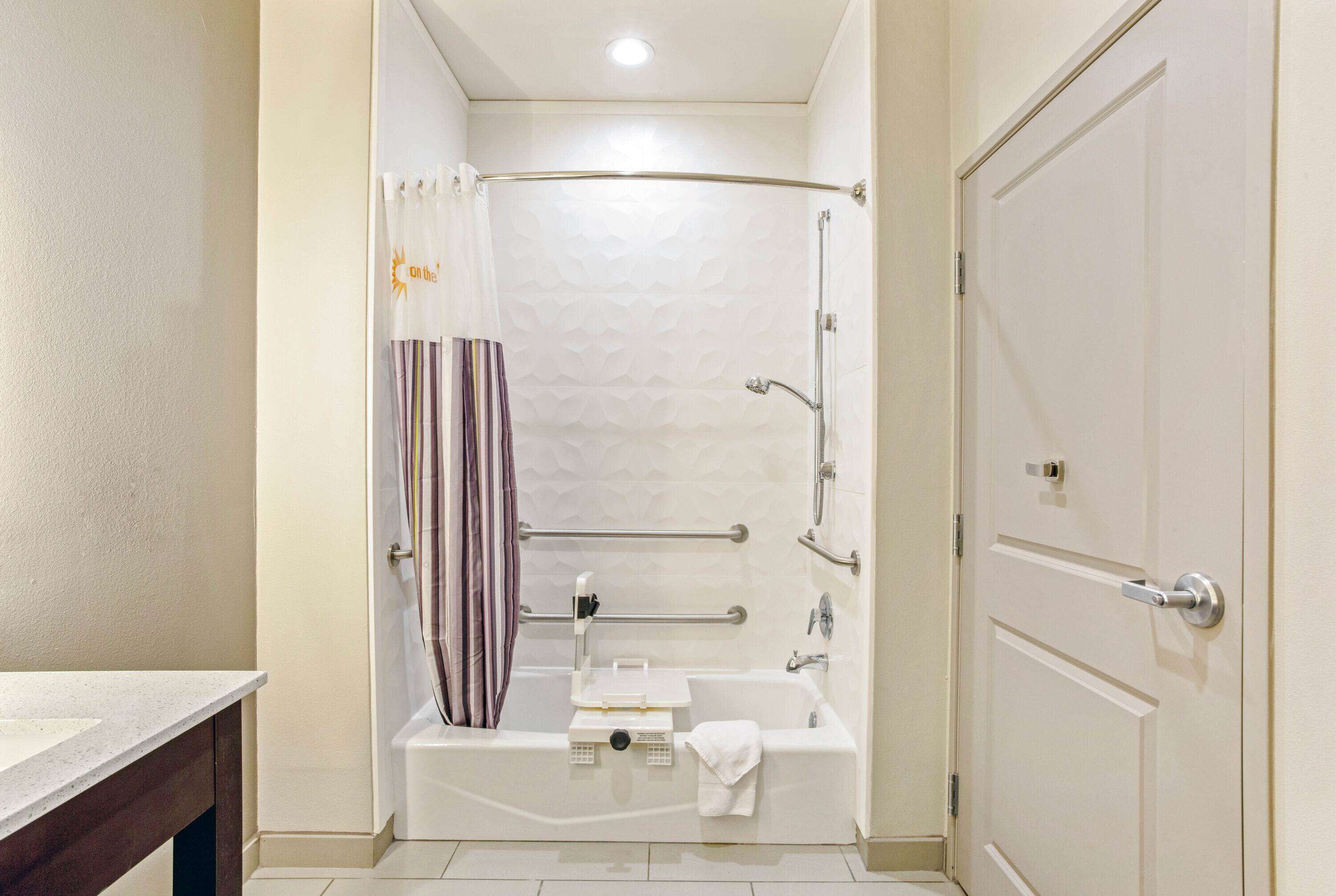 combined shower/bathtub, free toiletries, hair dryer, towels