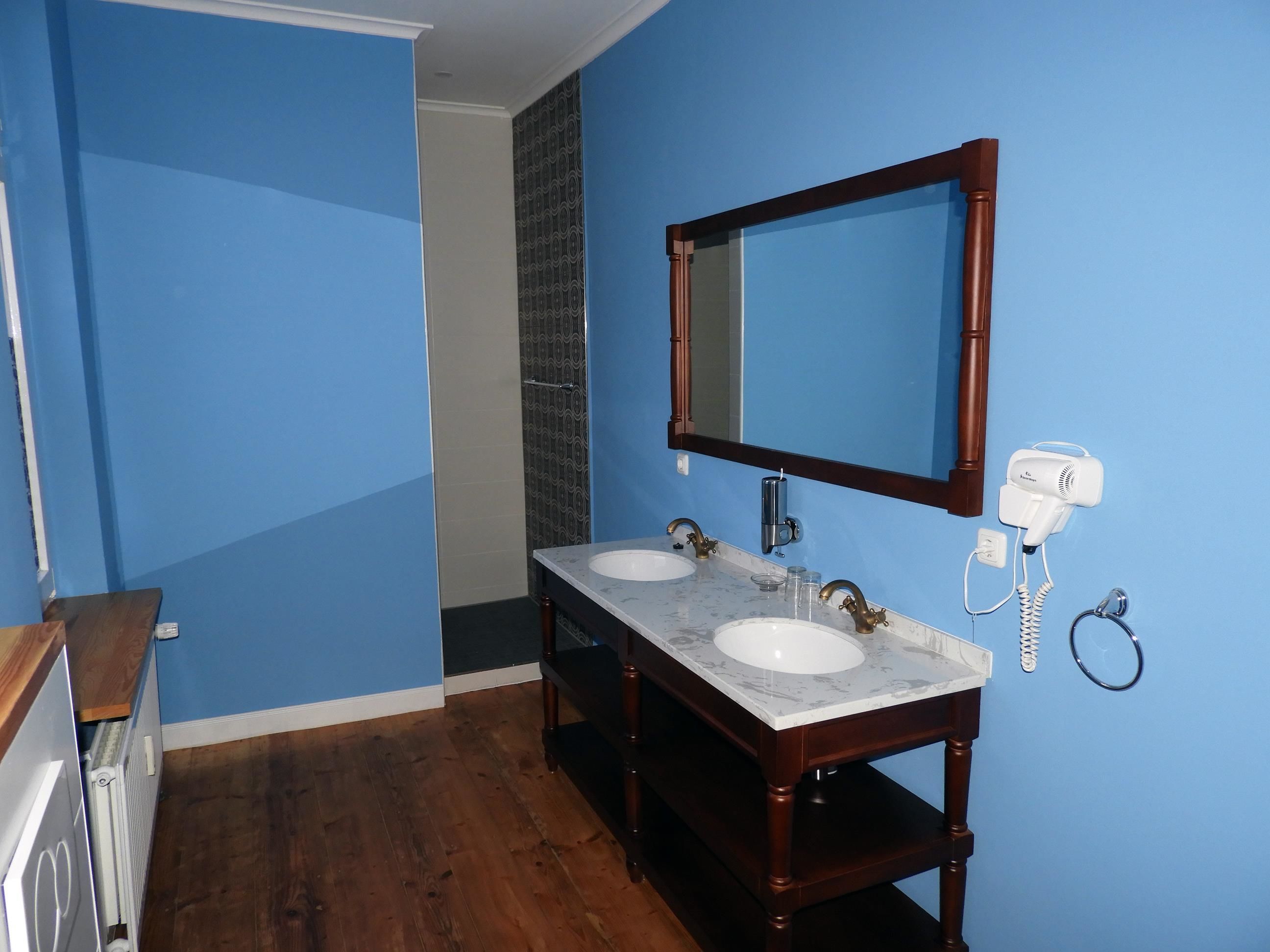exclusive suite | bathroom | shower, free toiletries, hair dryer, slippers