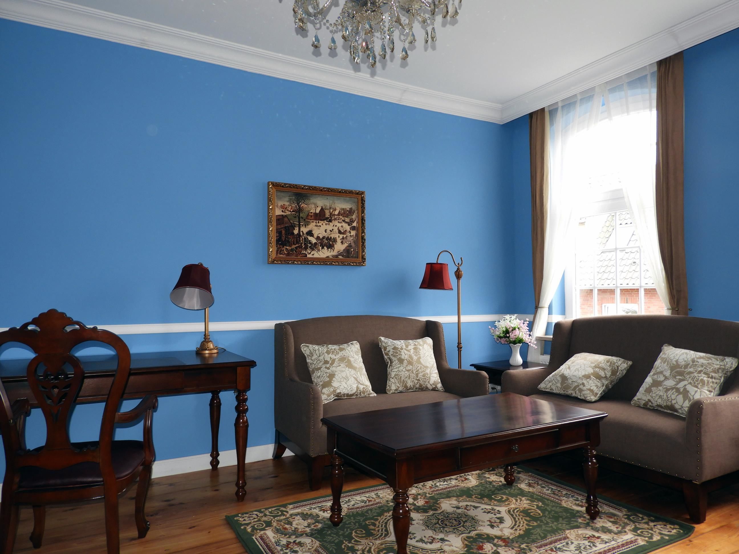 exclusive suite | living area | flat-screen tv, pay films