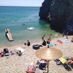 On the beach, sun-loungers, beach umbrellas