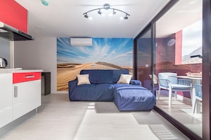 Apartment, Balcony, Pool View | Living area | 32-inch flat-screen TV with satellite channels, TV - Sol Mogan Suites (Mogan)