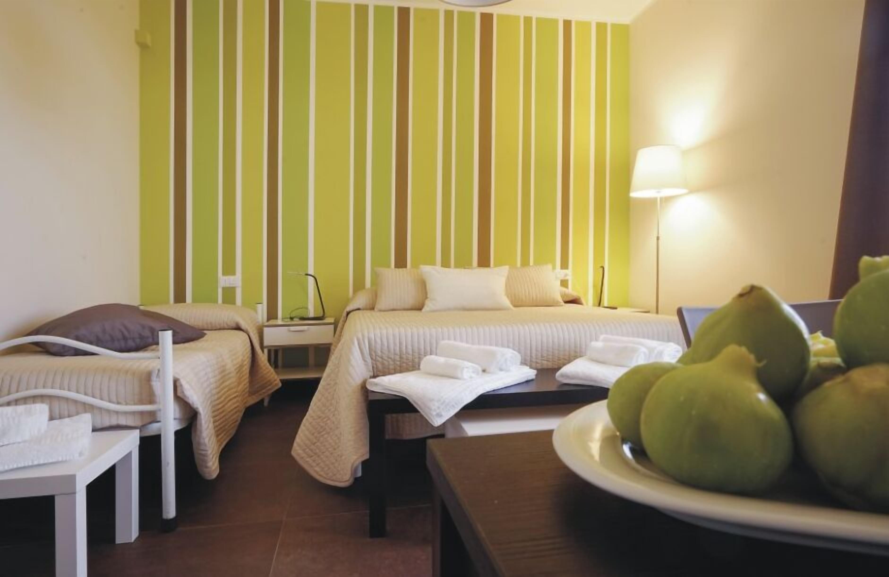 1 bedroom, hypo-allergenic bedding, down comforters, minibar