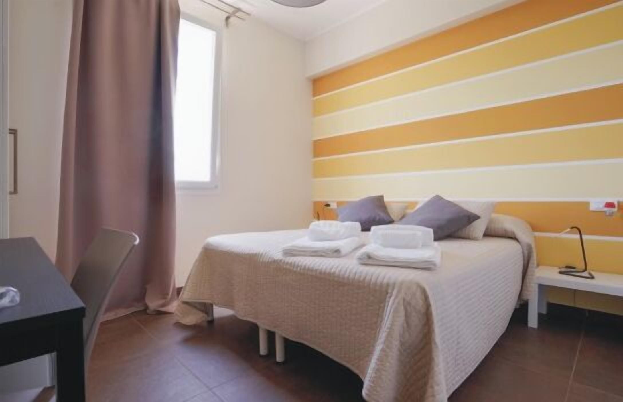 1 bedroom, hypo-allergenic bedding, down comforters, minibar