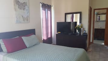 Townhome, 2 Bedrooms, Balcony | 1 bedroom, desk, iron/ironing board, cribs/infant beds