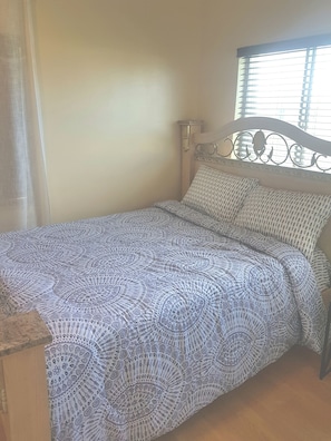 Room, 1 Queen Bed with Sofa bed (Unit shared female property manager) | 2 bedrooms, desk, iron/ironing board, free WiFi