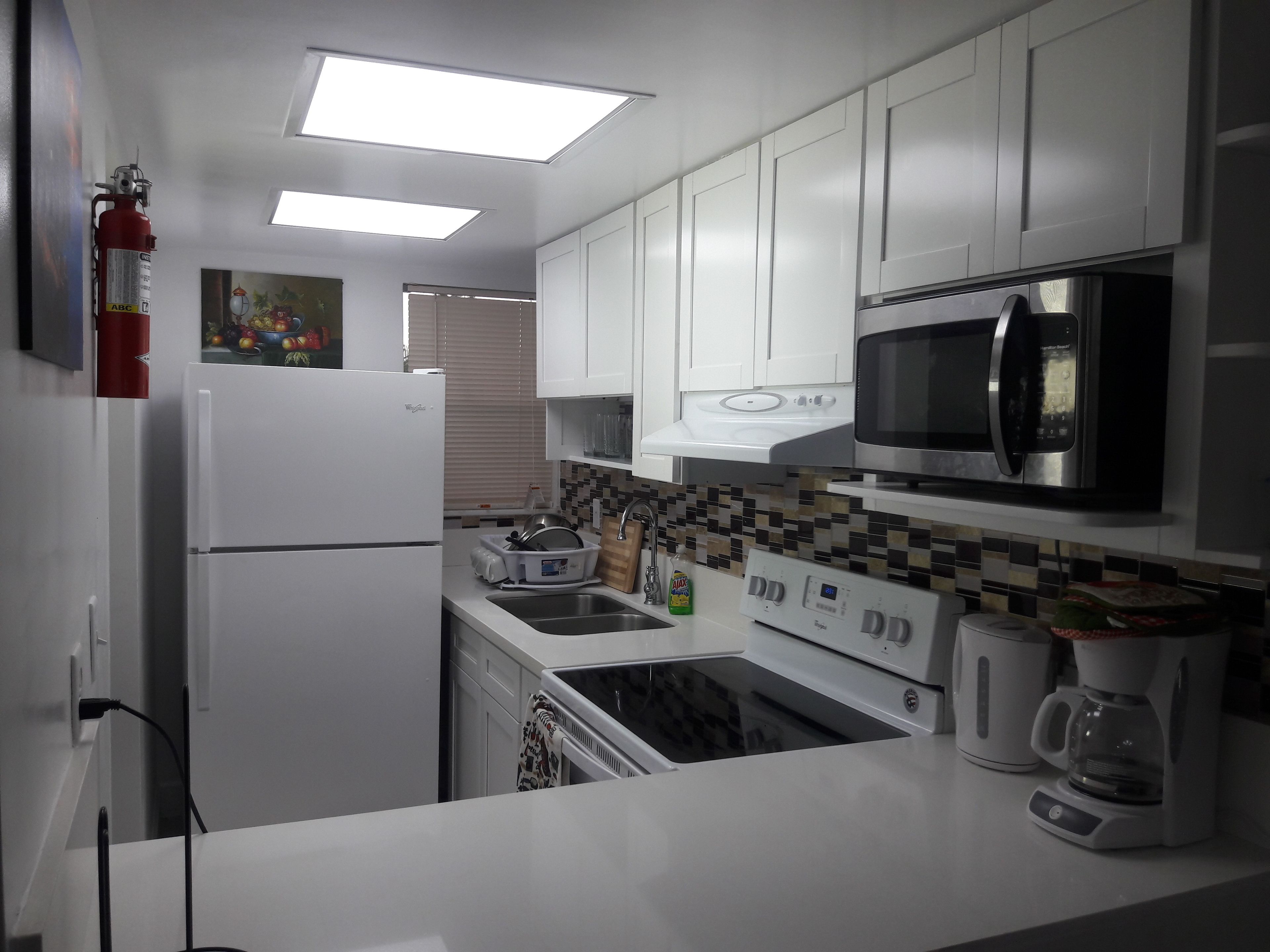 Standard Studio, 1 Queen Bed | Private kitchen | Full-sized fridge, microwave, oven, stovetop