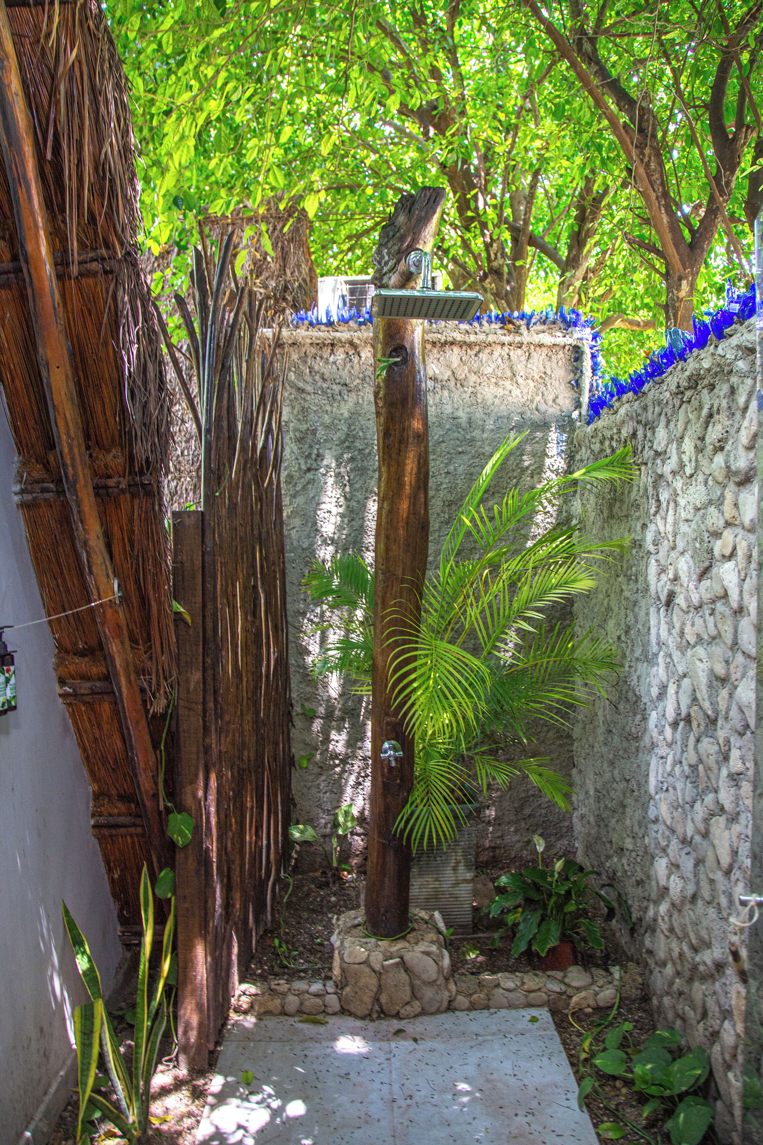 shower, rainfall showerhead, eco-friendly toiletries, towels