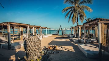 On the beach, beach towels, beach massages, beach yoga