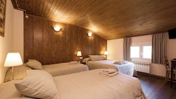 Quadruple Room | Premium bedding, in-room safe, desk, free WiFi