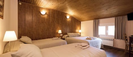 Quadruple Room | Premium bedding, in-room safe, desk, free WiFi