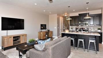 House, Multiple Beds, Golf View (Another Day In Paradise) | Living area | Flat-screen TV, DVD player