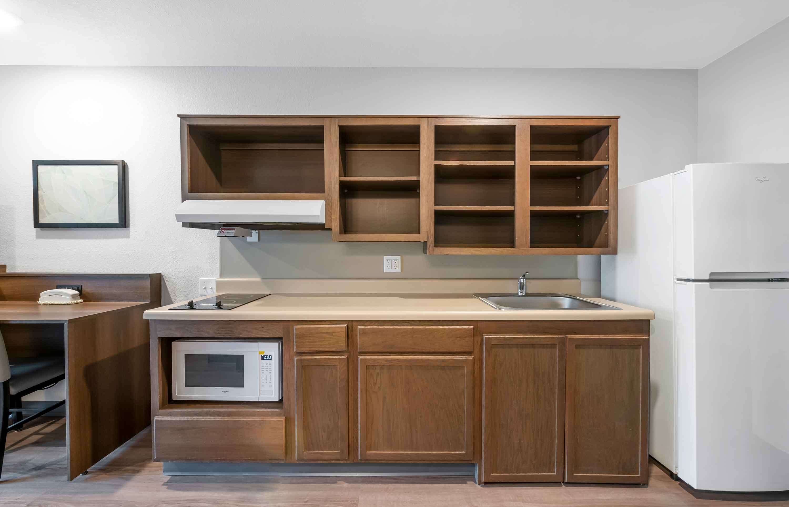 full-sized fridge, microwave, stovetop, freezer