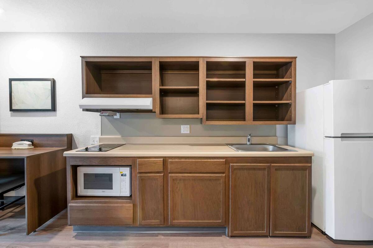 full-sized fridge, microwave, stovetop, freezer