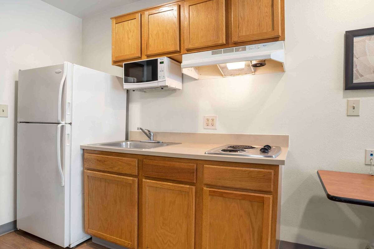 deluxe studio, non smoking, refrigerator & microwave | private kitchen | full-sized fridge, microwave, stovetop, freezer