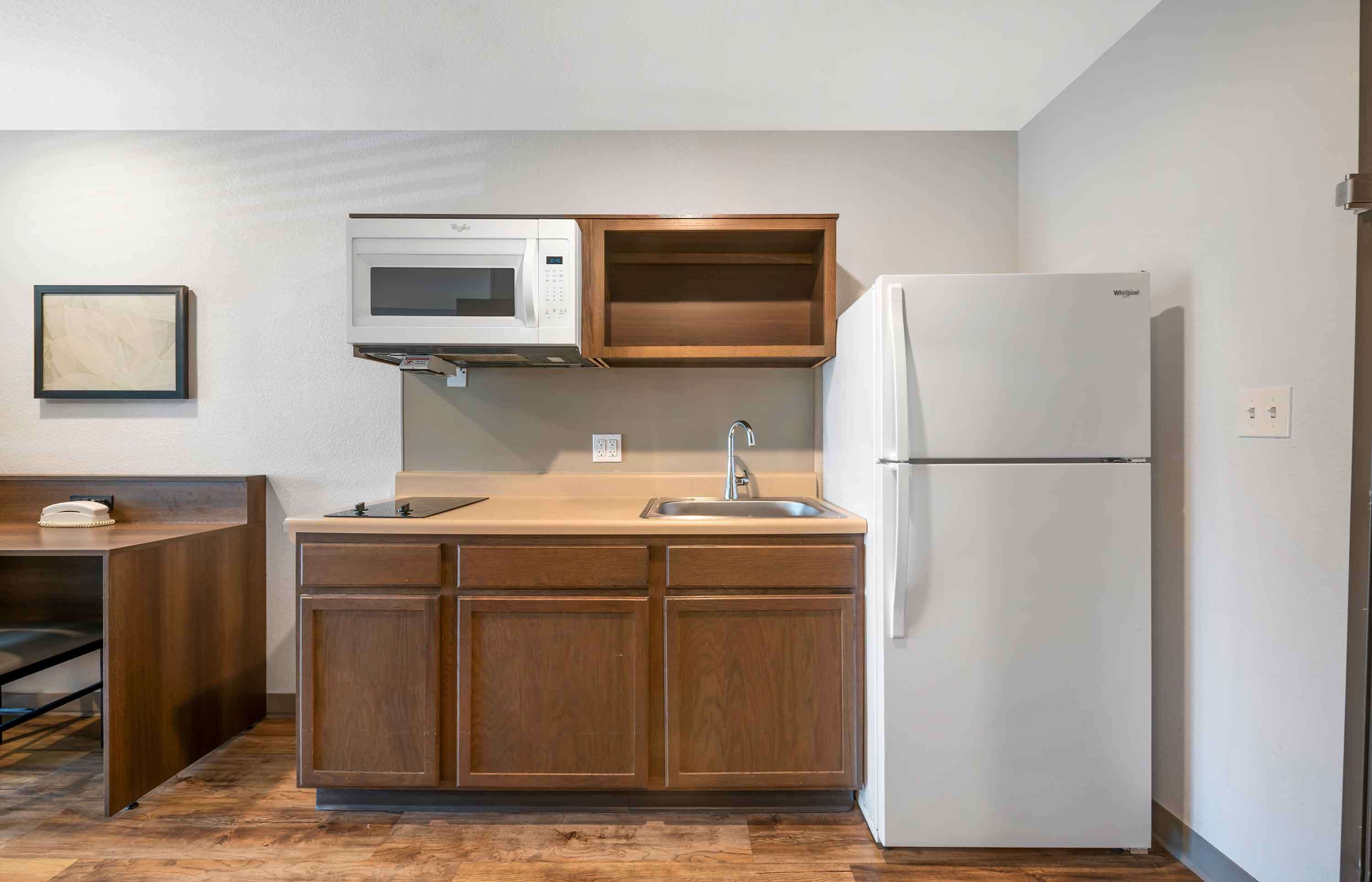 full-sized fridge, microwave, stovetop, freezer