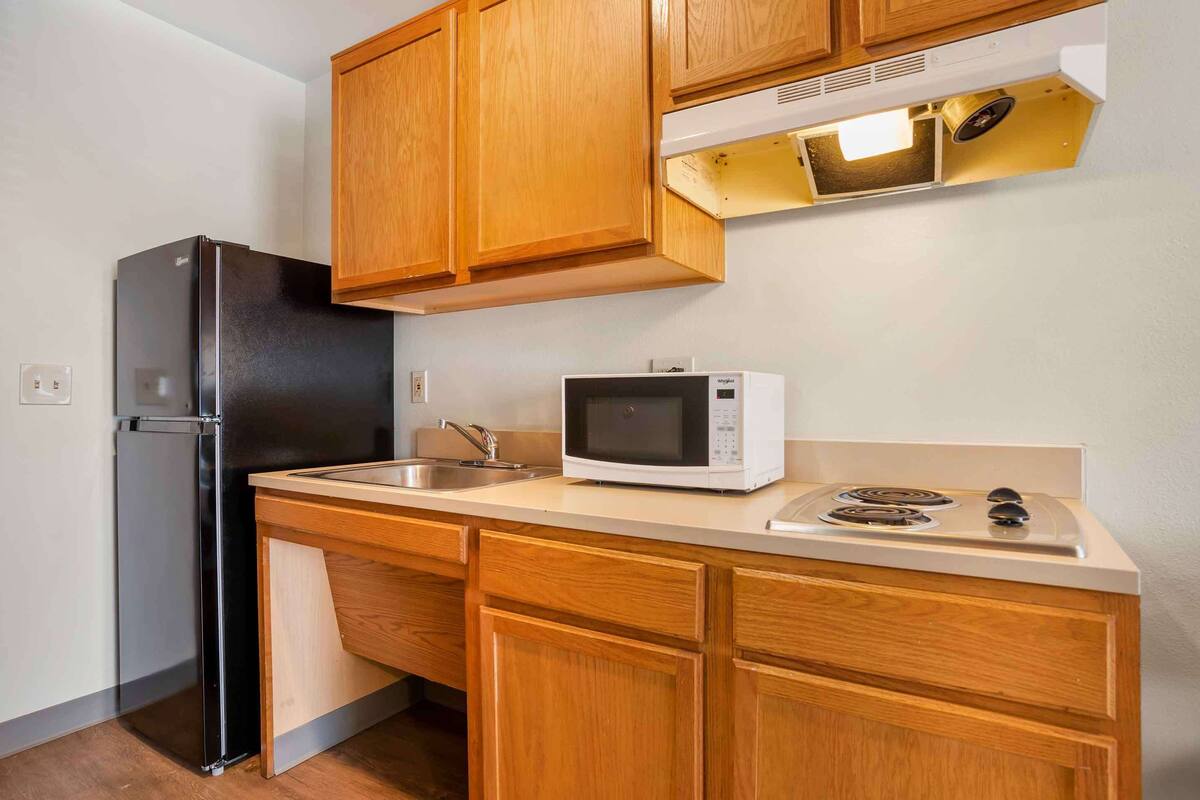 full-sized fridge, microwave, stovetop, freezer