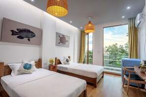 Habitación con 2 camas individuales, vistas al mar | Caja fuerte, sistema de insonorización, wifi gratis y ropa de cama