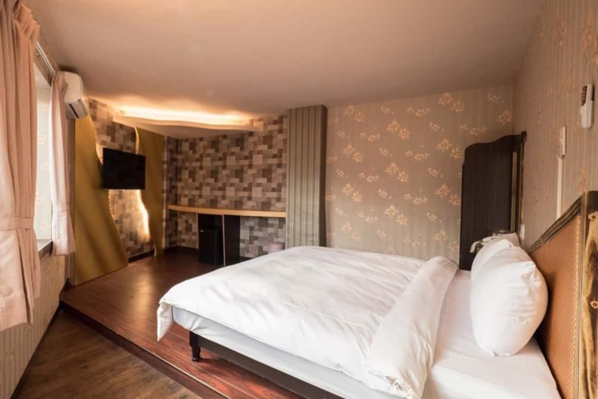 Habitación doble Deluxe | Escritorio, cortinas blackout, insonorización y wifi gratis