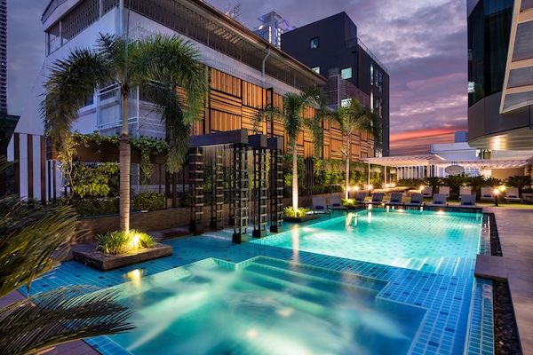 Outdoor pool, open 6:00 AM to 10:00 PM, pool umbrellas, pool loungers