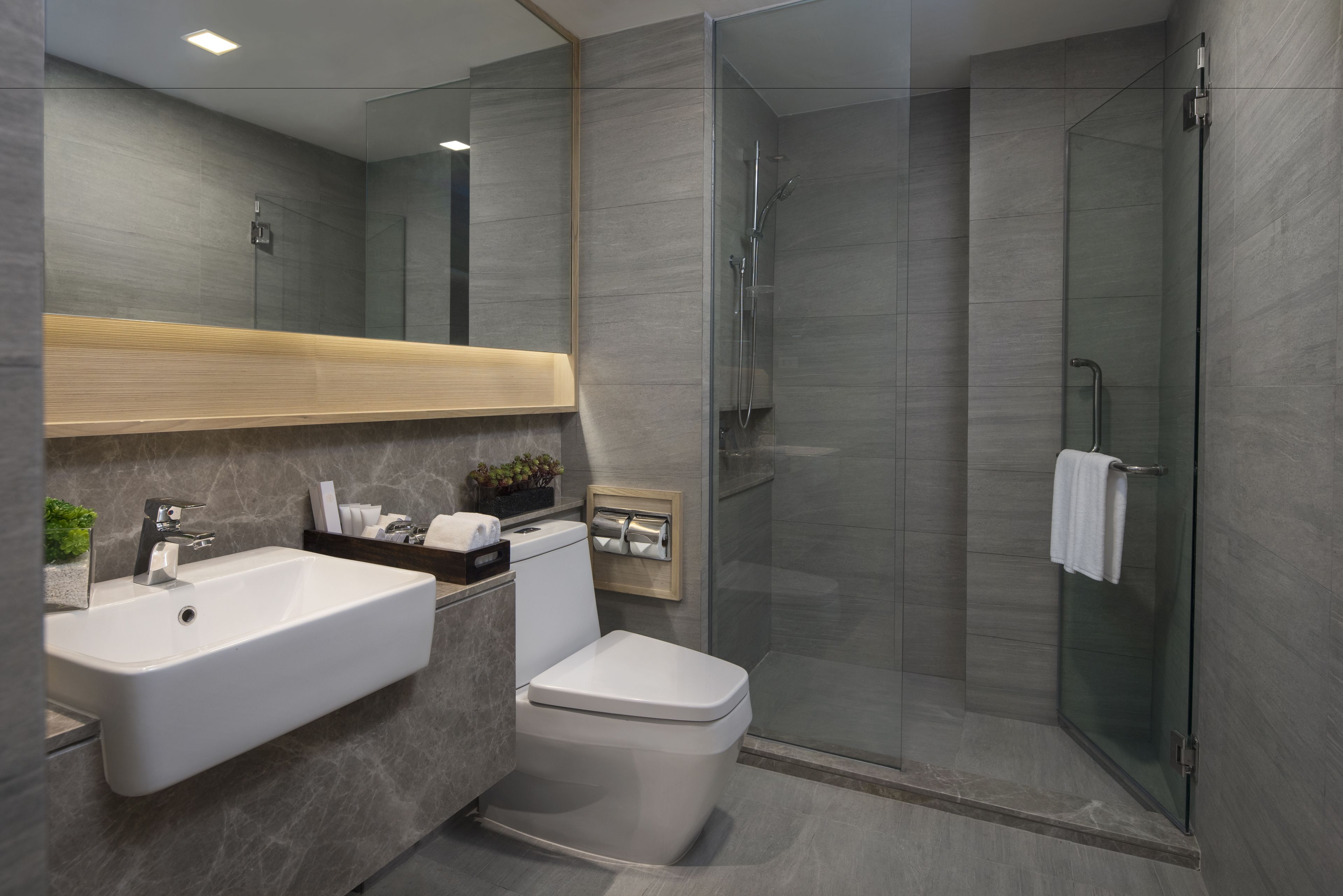 Designer toiletries, hair dryer, bathrobes, slippers