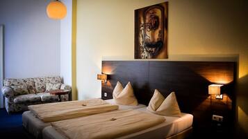 Comfort Twin Room | Premium bedding, desk, iron/ironing board, free cribs/infant beds