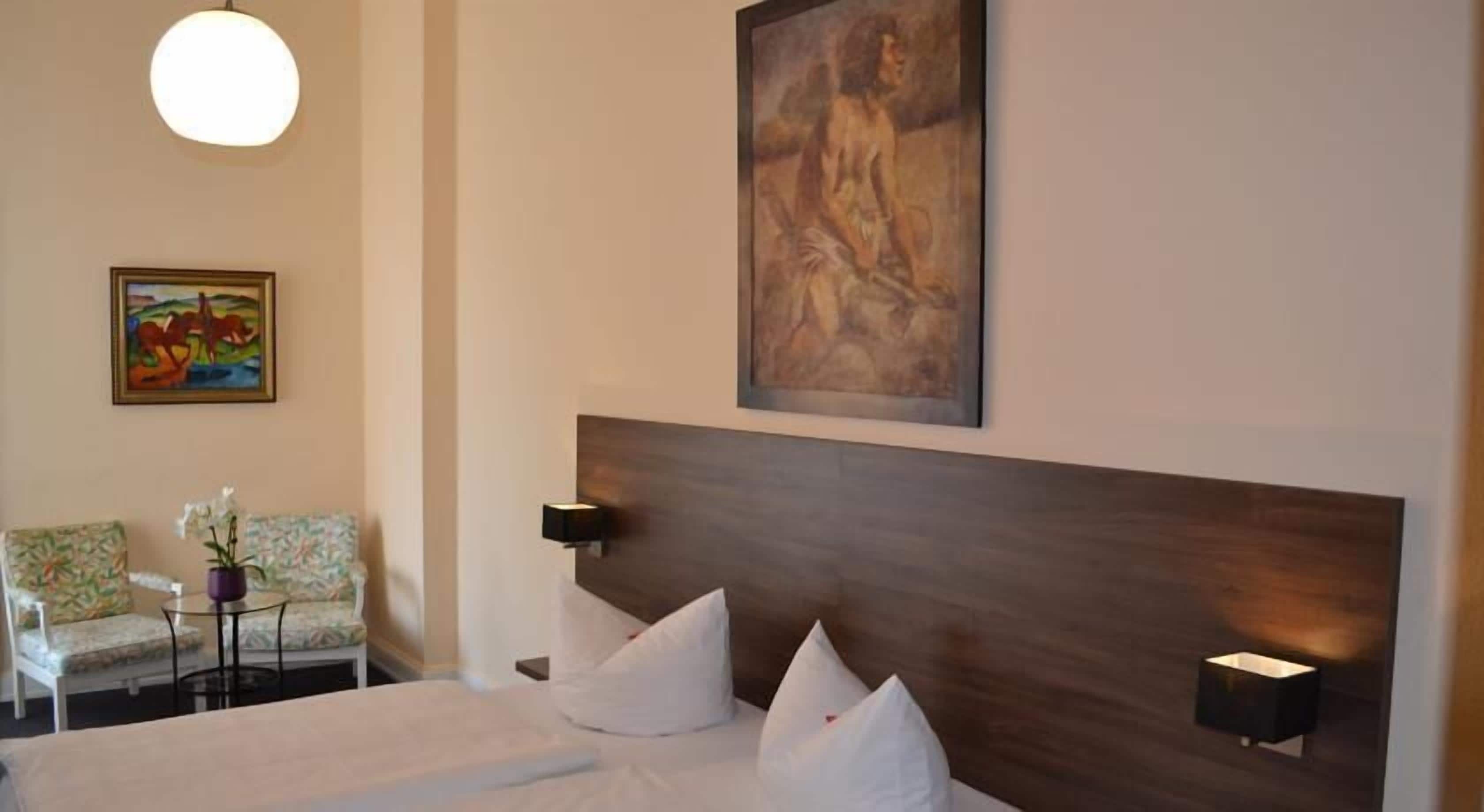 comfort twin room | premium bedding, desk, iron/ironing board, free cots/infant beds