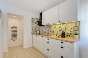 Apartment, 2 Bedrooms | Private kitchen | Fridge, microwave, stovetop, coffee/tea maker - Lion Apartments - La Playa (Sopot)