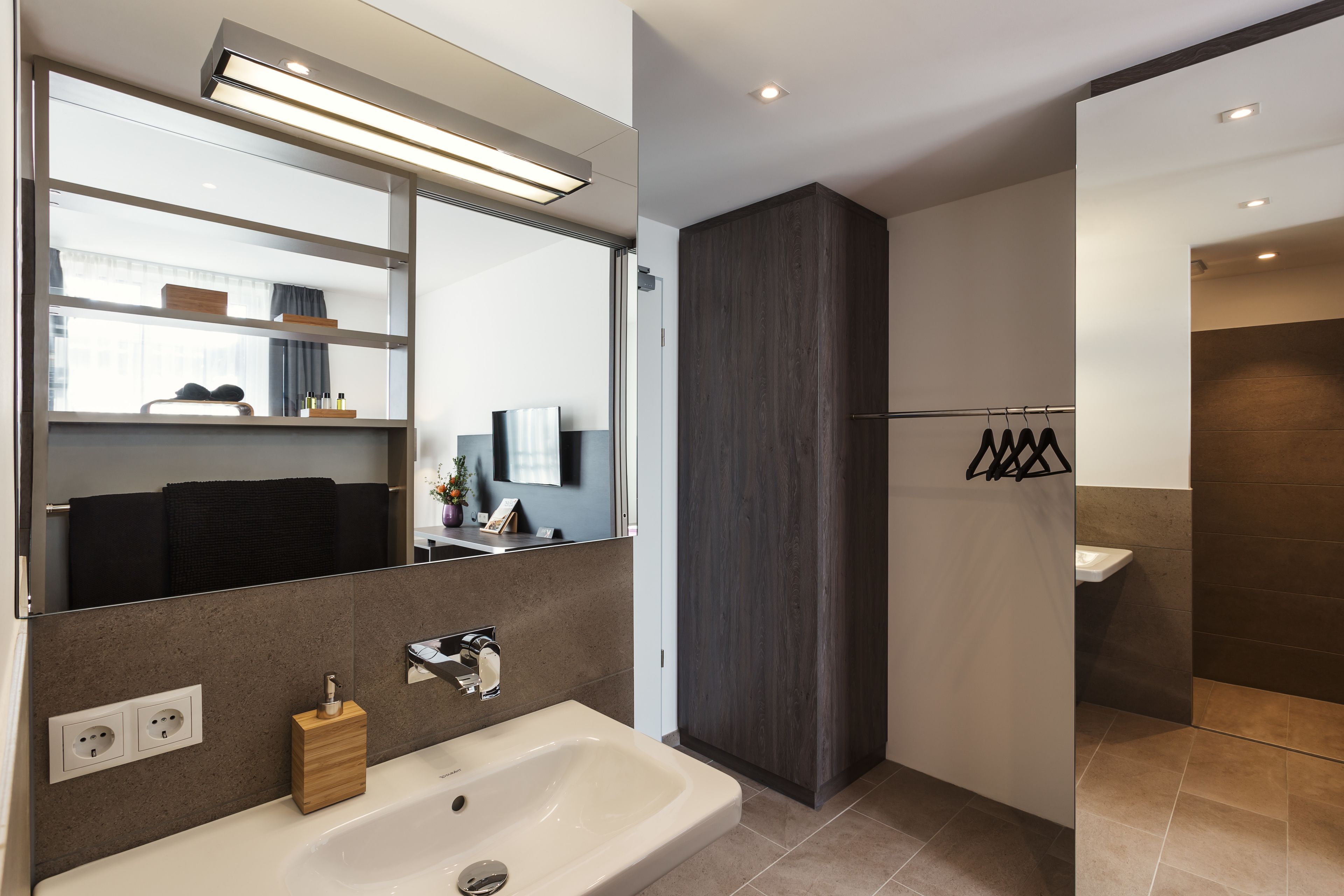 shower, free toiletries, hair dryer, towels