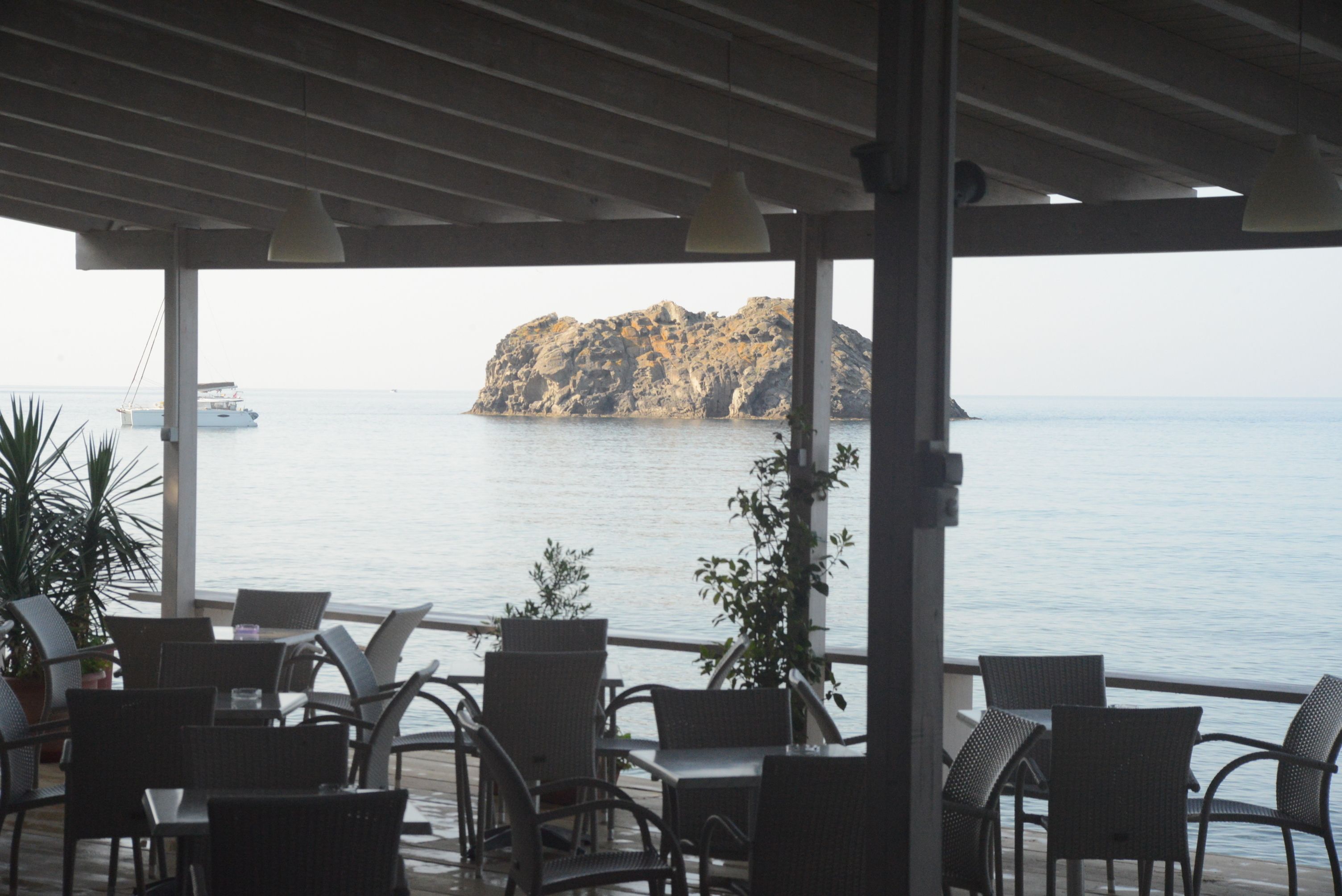 Breakfast, lunch, dinner served; Greek cuisine, beach views 