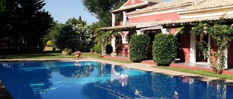 Indoor pool, outdoor pool, pool umbrellas, pool loungers