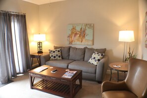 Standard Bungalow | Living area | 40-inch flat-screen TV with satellite channels, fireplace - Valhalla Resort Hotel (Helen)