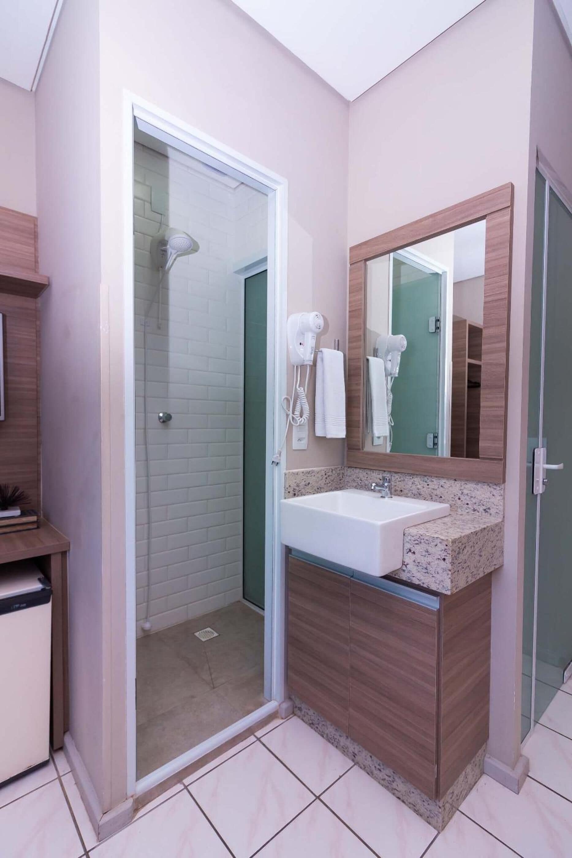 shower, free toiletries, hair dryer, towels