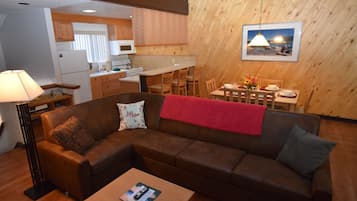 Suite, 2 Bedrooms | Living room | Flat-screen TV, fireplace