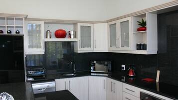 Classic Apartment, 2 Bedrooms | Private kitchen | Full-sized fridge, microwave, oven, stovetop