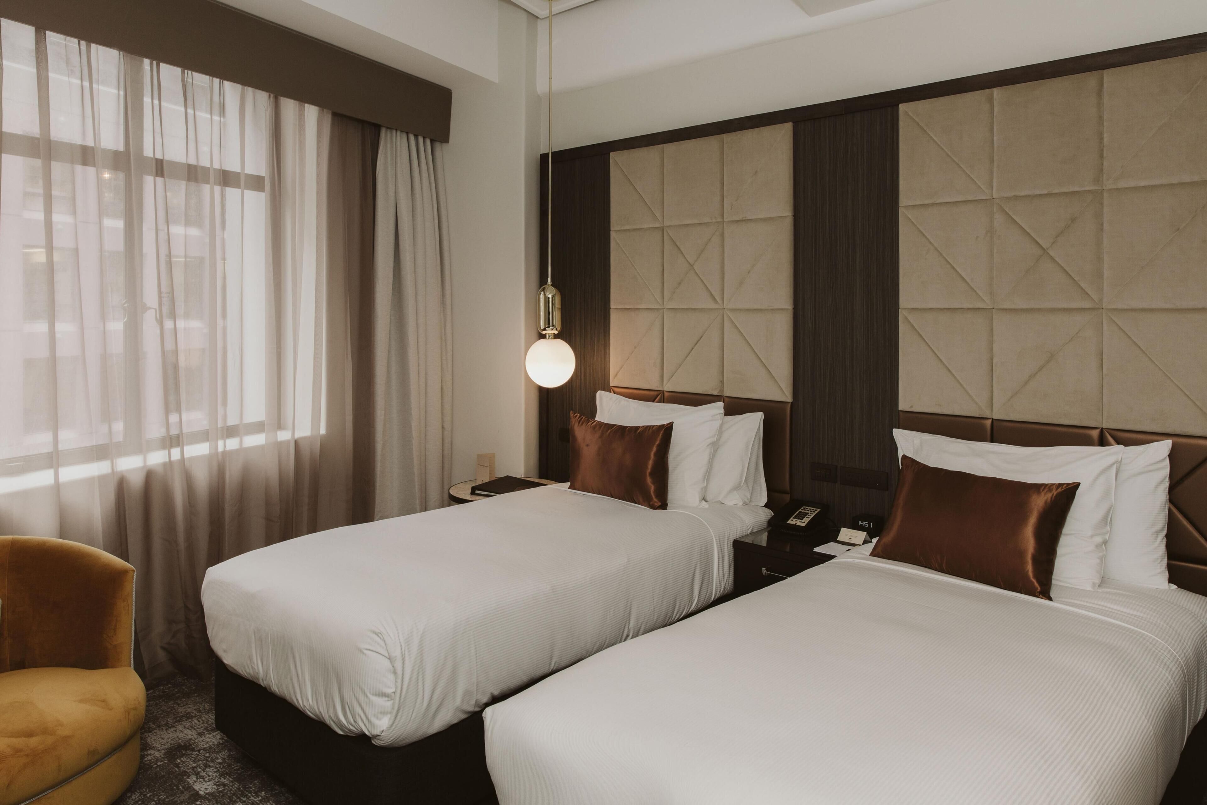 Twin Room | Egyptian cotton sheets, premium bedding, down comforters, pillowtop beds