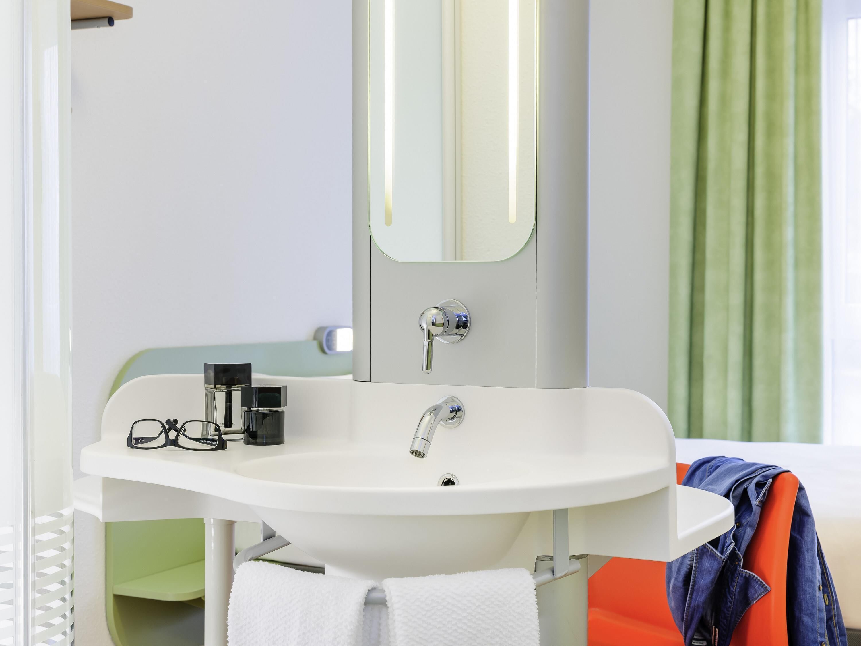 Hypo-allergenic bedding, desk, blackout drapes, soundproofing