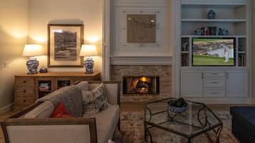 Smart TV, fireplace, DVD player, books