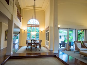 soaring ceilings in dining room and living room