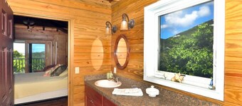 フィッシュテイルズアカリビアンコテージスタイルの家とプール、リー��フベイビーチまで徒歩