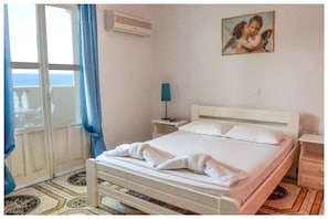 Apartment, 1 Bedroom | In-room safe, iron/ironing board, cribs/infant beds, rollaway beds